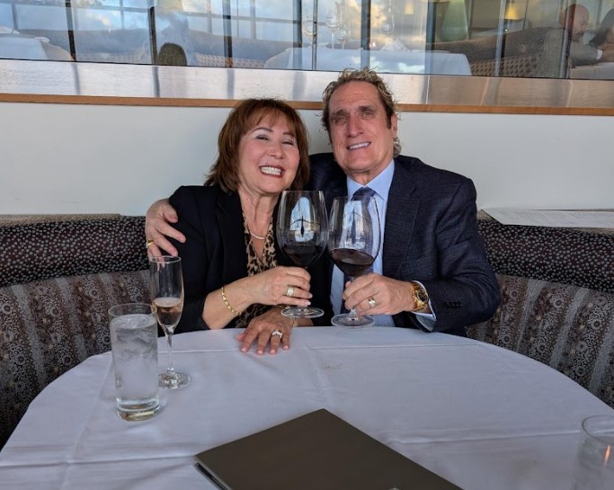 Customers using the Customer Referral program at dinner